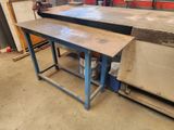 a table that is sitting in the middle of a room