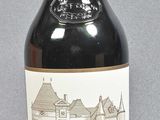 a bottle of wine that is sitting on a table