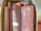 a cardboard box filled with different types of tools