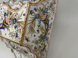 a small decorative bowl with a floral design on it