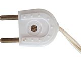 a white electrical plug with a brown wire attached to it