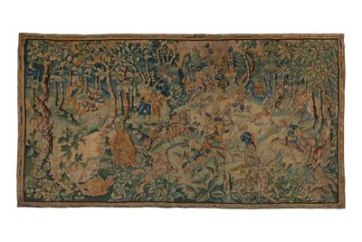 a tapestry with a picture of a forest scene on it