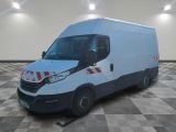 a white van that is parked in a room