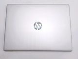 a laptop that is sitting on a white table