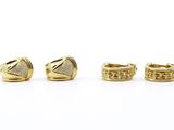 un ensemble de trois bagues en or serties de diamants