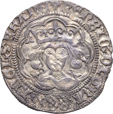 une pièce d'argent surmontée d'une couronne