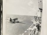 a black and white photo of a plane flying over the ocean