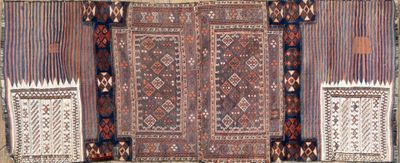 a large rug on display in a room