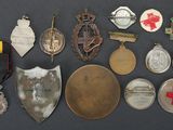 many medals and medals that are on a table
