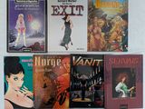 un grand nombre de livres posés sur une table