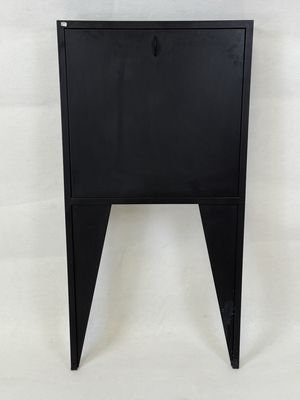 an image of a black metal cabinet with a door