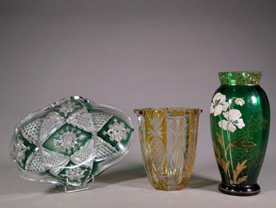 three vases sitting next to each other on a table