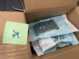 a cardboard box with a bunch of items inside of it