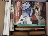 a box full of books sitting on top of a table