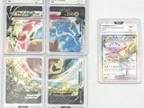 plusieurs cartes pokemon posées les unes sur les autres sur une table