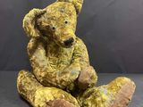 a teddy bear that is sitting on a table