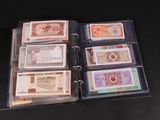 many different types of currency in a binder
