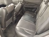 a picture of the inside of a car with leather seats
