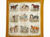 une image représentant une écharpe ornée de chevaux