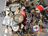 a pile of assorted metal items on a table