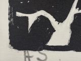a black and white drawing of a snail on a piece of paper