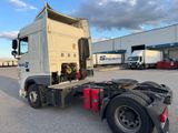 a semi truck that is parked in a parking lot