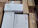 many boxes that are stacked on top of each other