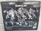a box that has a robot toy in it