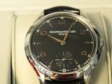 a watch that is sitting in a box on the table