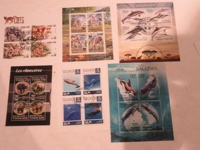 a lot of different stamps on the table together
