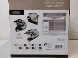boxed picture of a box of motorcycle helmets sitting on a table