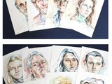portraits of people drawn in colored pencils on a blue surface