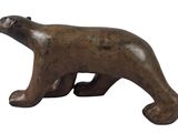 statue of a brown bear on a white background