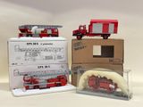 two fire trucks and a firetruck in a box