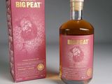 a bottle of big peat sitting next to a box