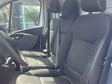 a picture of a car with black leather seats in the back