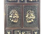an old wooden cabinet with two doors and two drawers