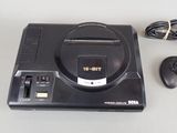 a video game console with a game controller and a mouse