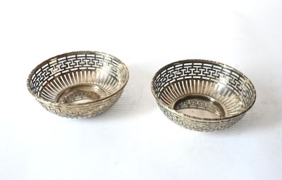 pair of silver plated bowls on a white background