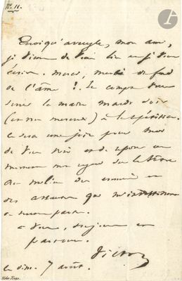 a handwritten letter written in black ink on a piece of paper