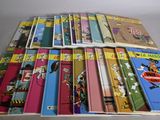 a lot of children ' s books on the table