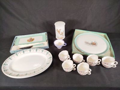 a table with a lot of dishes and cups and saucers