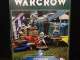 the box for the warcrow figurine is shown
