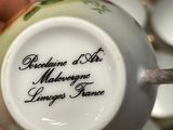 a person holding a cup with a quote on it