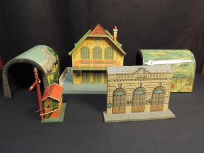 several different types of toy houses are displayed on a black background