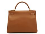 a brown leather handbag on a white background