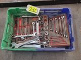 a box full of tools sitting on the floor