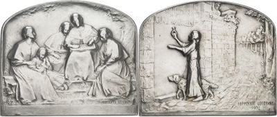 two silver reliefs of jesus and mary with a dog