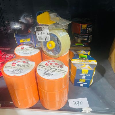 many rolls of tape on the shelf in the store