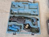 a tool in the case on the ground